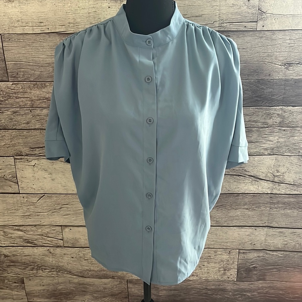 Lighh blue button up blouse